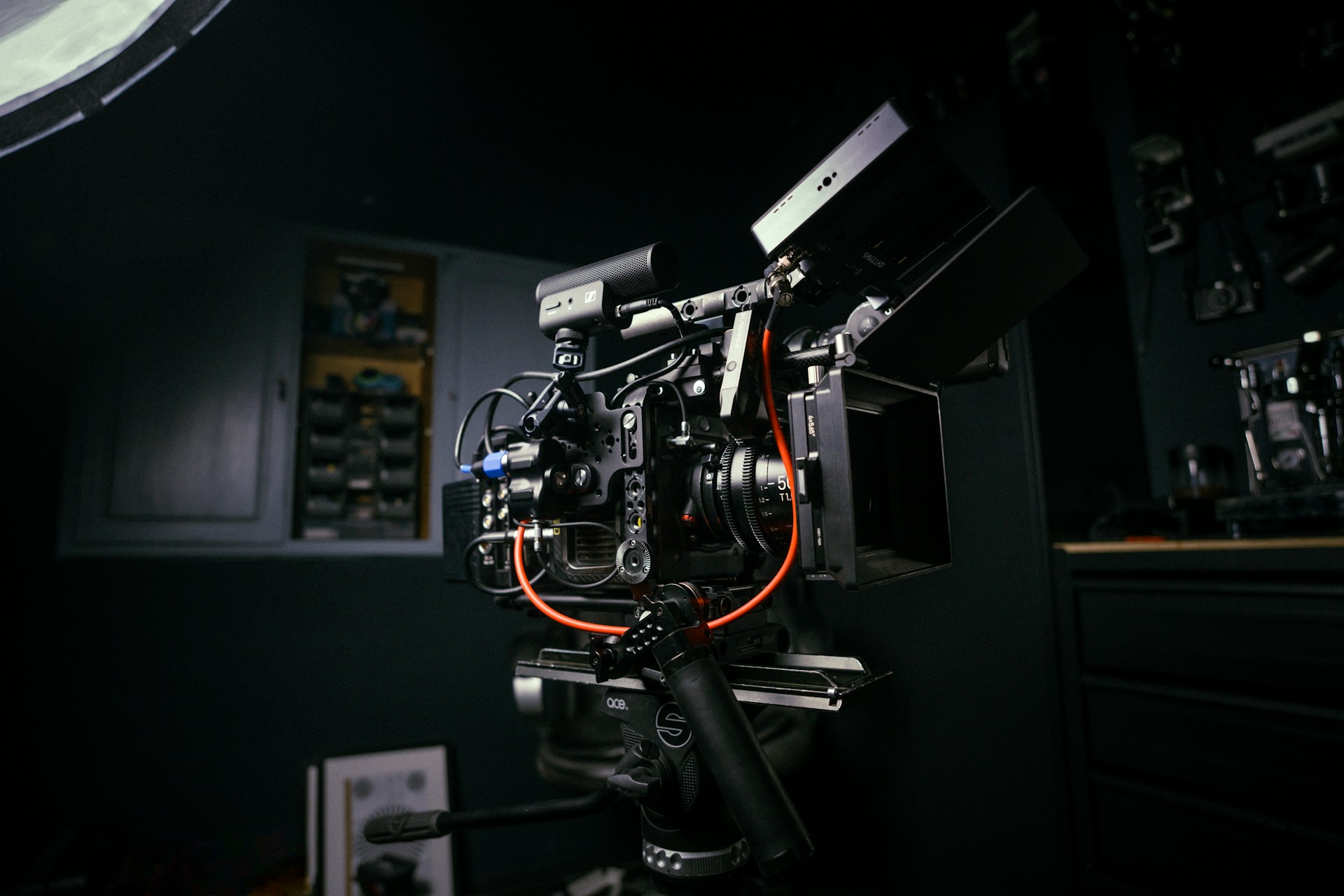 Cinema camera rig in a dark studio — illustrative photograph
